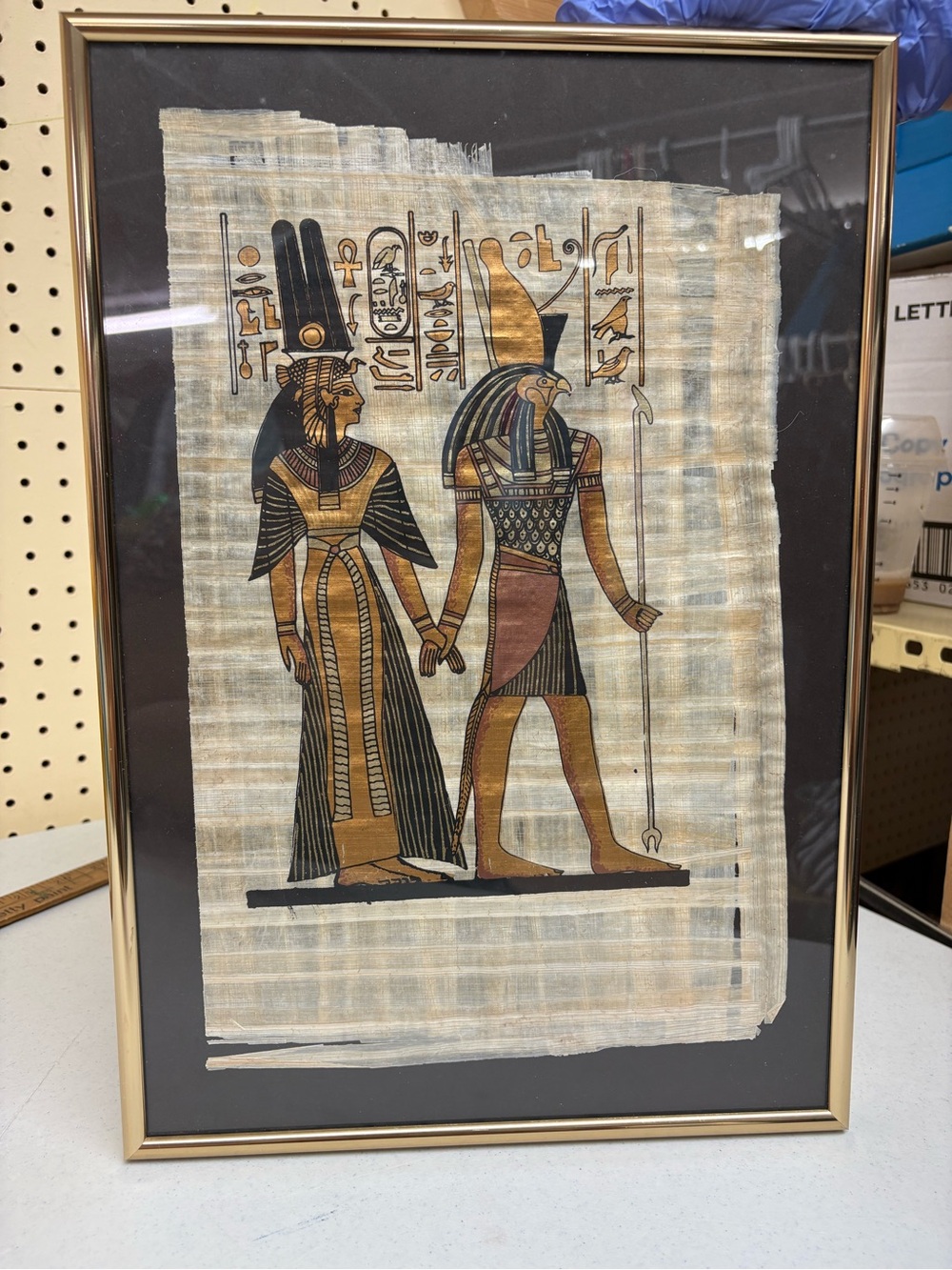 Egyptian papyrus artwork depicting Horus and Queen Nefertari